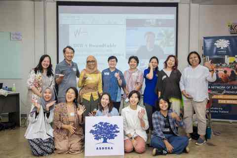 Participants of Thailand's DIWA Onwards Together event pose together