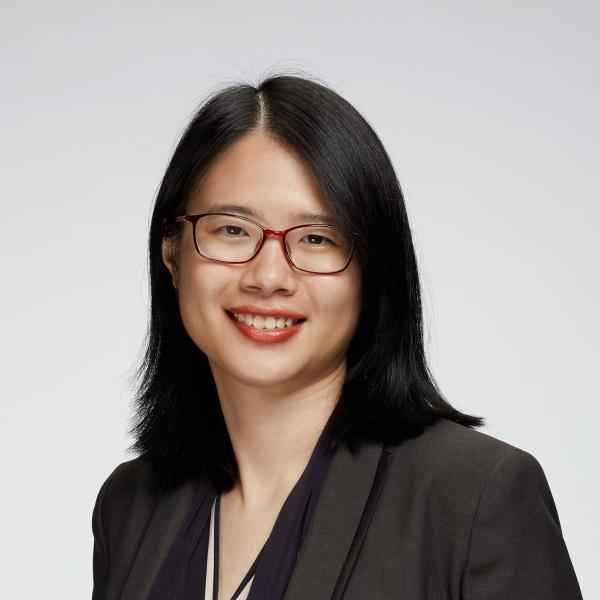 Photo of Cindy Mei Lien Chew (Malaysian woman wearing glasses and a gray blazer)